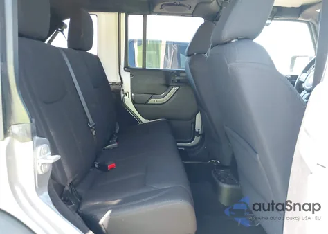 2013 Jeep Wrangler Unlimited Sport z USA, uszkodzony, nr VIN 1C4BJWDG4DL657663